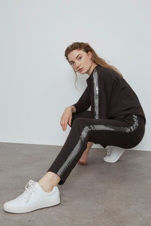Damenhose mit schwarzen und silbernen Streifendetails - Verda