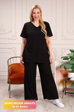 Großes Komfortmodell mit seitlichem Schlitz. Bequeme zweiteilige Tunika mit Hose. Stilvolles 2-teiliges Bottom-Top-Set - Tarzımsüper