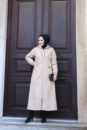 Krem İçi Çizgili Önü Cepli Ve Kendinden Astarlı Su Geçirmez Kadın Uzun Trençkot - Vibeys Collection
