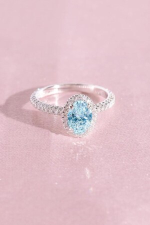 one. 01 Carat Oval Sapphire Solitaire Ring - Crystal Diamond Zirconia