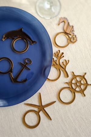 Set mit 6 Serviettenringen aus transparentem, braunem Acryl mit Meeresmotiv SPH-3036-MG - Story
